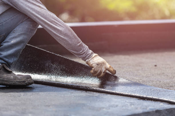 Professional Emergency Waterproofing technician working in Midland, MI